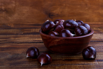 Fresh chestnuts in a bowl
