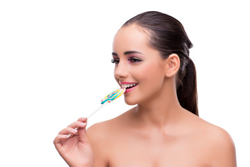 Woman with colourful lollipop isolated on white