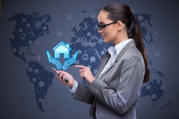 Young woman in online hotel booking concept