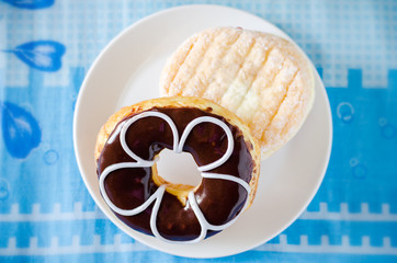 Chocolate donut with flower pattern