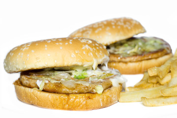 Fast food tasty beef burger with fried potatoes.