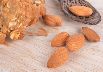 Almonds  and Cookie on the wooden floor