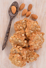 Cookie and Almonds on the wooden floor