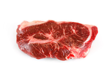 fresh raw rib eye steak on white background