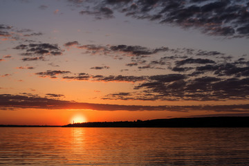 Fototapeta na wymiar river sunset sky sun