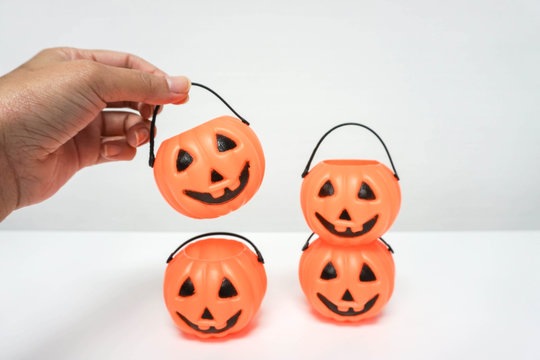 hold a bucket Jack-O-Lantern pumpkin