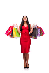 Woman in red dres after shopping isolated on white