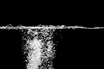 Obraz premium Waves splash of water movement in the dark.