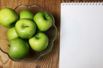 green apple on a wooden background
