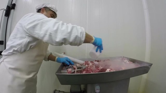Butcher Pouring Dry Ice on Fresh Meat - Slow Motion
