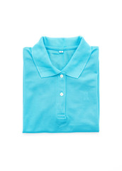blue shirt. folded t-shirt on white