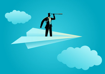 Businessman using telescope on paper plane