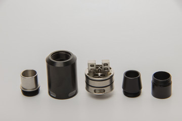 Dismantled parts of the electronic cigarette black and steel col