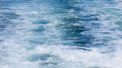 Wave of a ferry ship on the open ocean