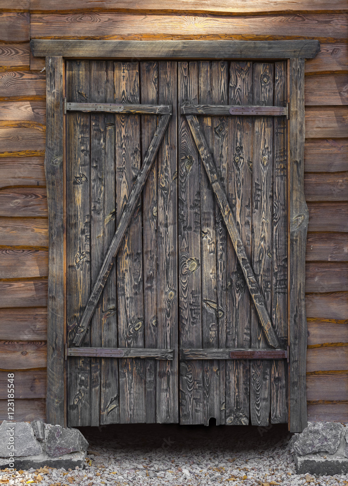 Wall mural wooden gate closeup