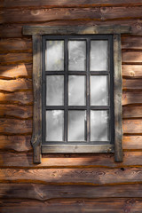 window closeup in a wooden house