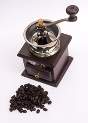 Coffee grinder winch with coffee bean on white background