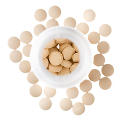 Container with pills close-up