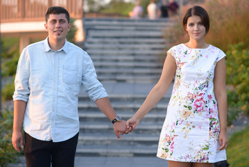 Couple holding hands