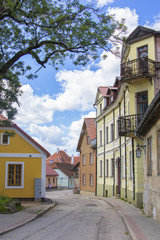 Fototapeta na wymiar background landscape view of old streets with wooden houses in the town of Cesis, Latvia