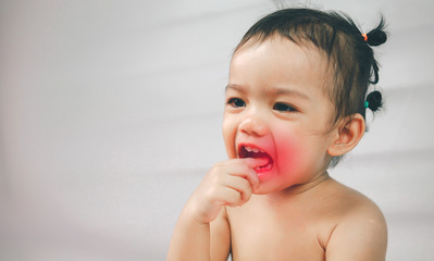 little girl child have toothache