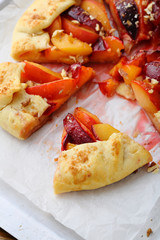 Sliced plums pie closeup