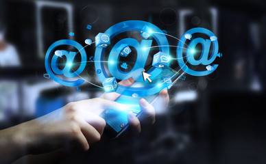 Businessman holding 3D rendering email icon over mobile phone