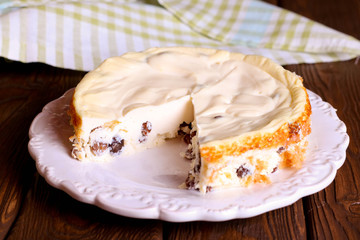 Delicious cottage cheese souffle with raisins on white plate/Cot