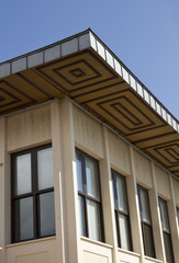 Constructionism old building with windows  and blue sky