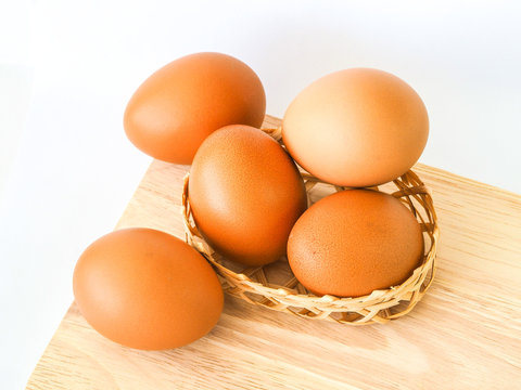 Place the eggs in a small basket