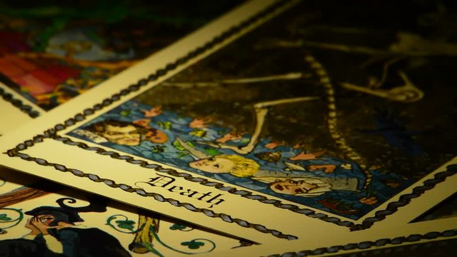 Cards of tarot death and the devil gyrating