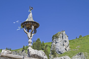 Mittagsglocke auf Bauernhaus