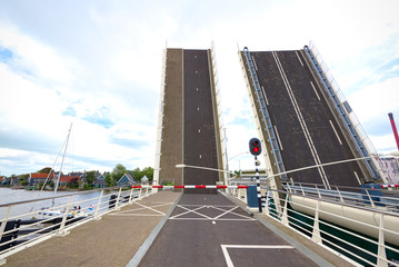 Naklejka premium Drawbridge is opening in Zaandam, Netherlands