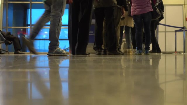 People boarding to the airplane at the gate in airport