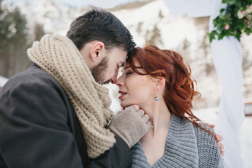 Beautiful wedding couple on their winter wedding. Close-up