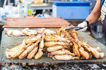 Chicken thighs cooked on the grill.