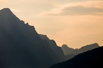 Fototapeta na wymiar Highlighted rocky peaks of mountains