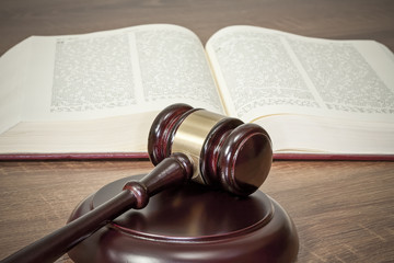 Judge gavel and old books