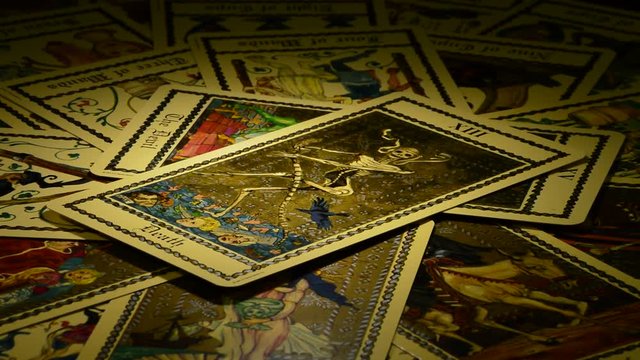 Tarot card of death and the devil gyrating