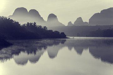Beautiful sunrise and reflections at Nongtalay lagoon