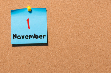 November 1st. Day 1 of month. Calendar on notice board. Autumn time. Empty space for text