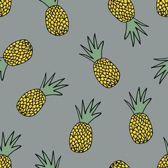Seamless pattern with hand drawn pineapples.
