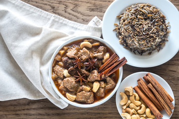 Thai Massaman Curry on the wooden background
