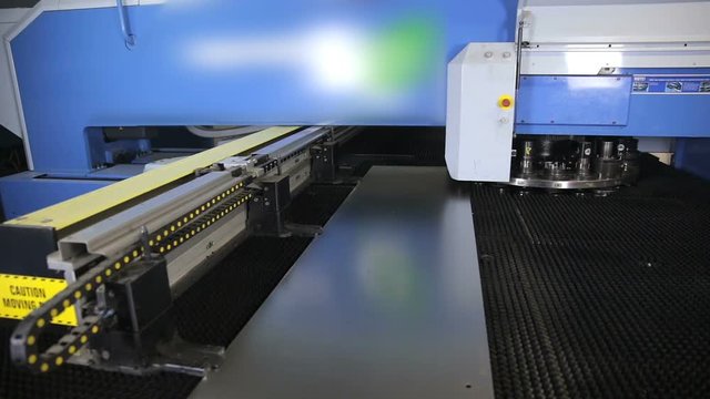 Punching machine. Robotic automated cnc machine working. Timelapse