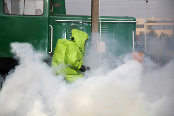 firemen in action, Firefighters exercises train accident, chemical contamination
