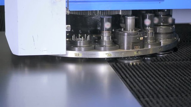 Punching machine. Robotic automated cnc machine working. HD