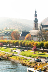Obraz premium Landscape with town Cochem on river moselle. Fall season.
