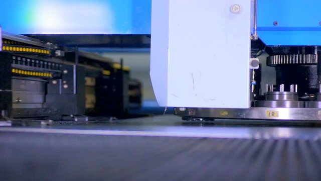 Punching machine. Robotic automated cnc machine working. HD