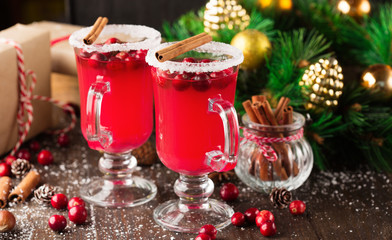 Festive Cranberry drink on Christmas background, holiday time, winter concept