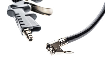 Air compressor gun accessory mount for inflating car tire.